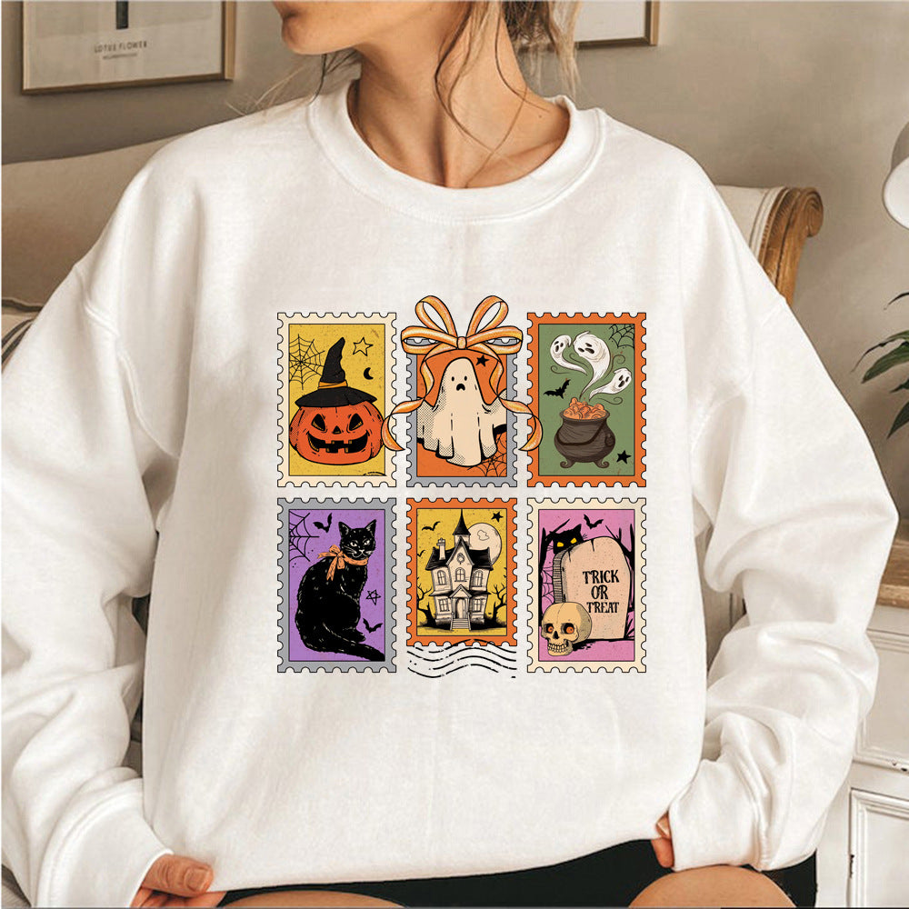 Halloweenský svetr Cauldron Cat | s koláží strašidelných razítek