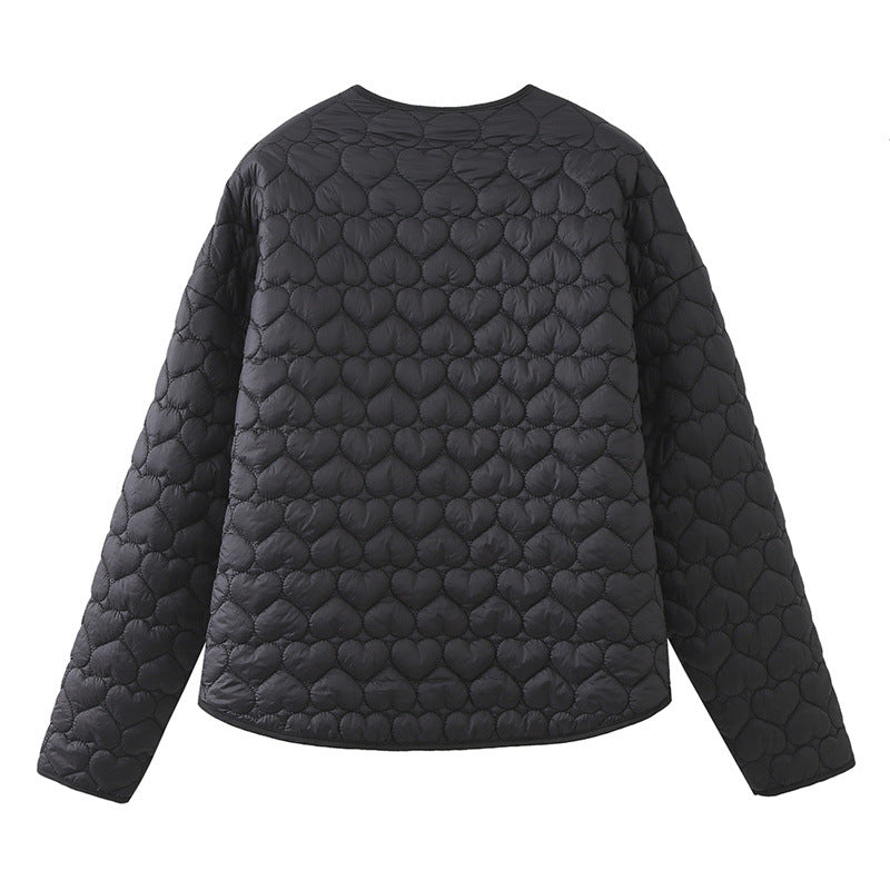 Louise Mortensen | Quilted cropped jacket with heart pattern