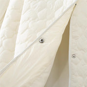 Louise Mortensen | Quilted cropped jacket with heart pattern