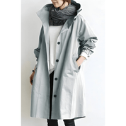 Amélie Rousseau | Oversized frakke med hætte og elegante knapper