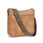 Trine Madsen | Crossbody taske i cognacbrun faux læder med boho skulderrem