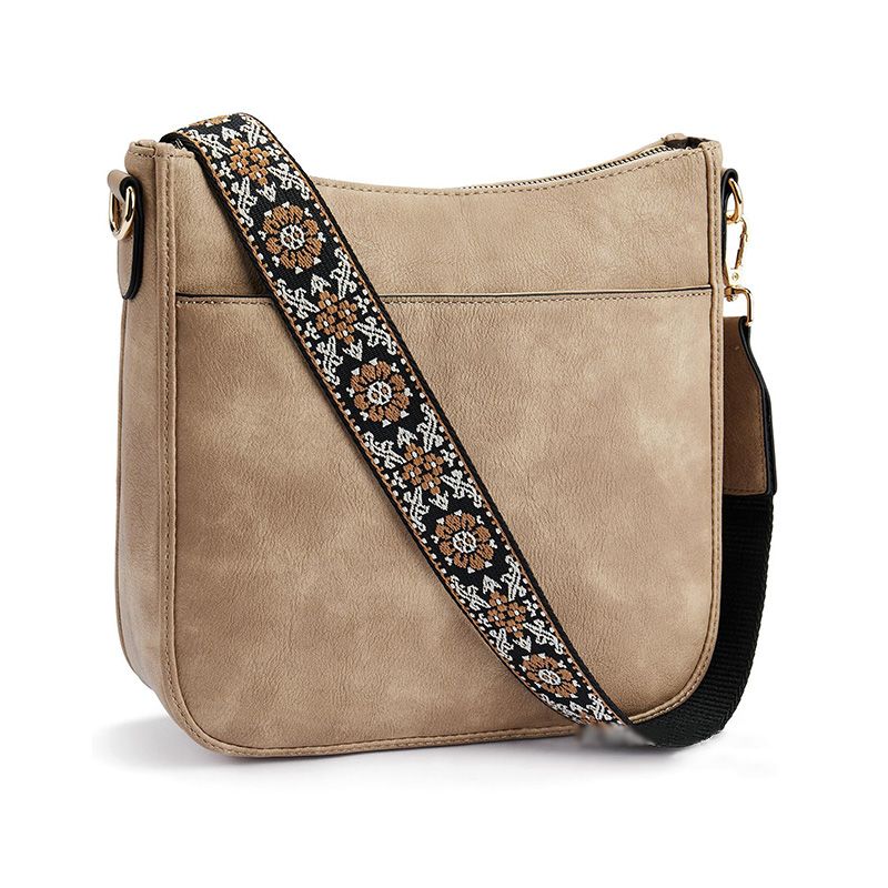 Trine Madsen | Crossbody taske i cognacbrun faux læder med boho skulderrem