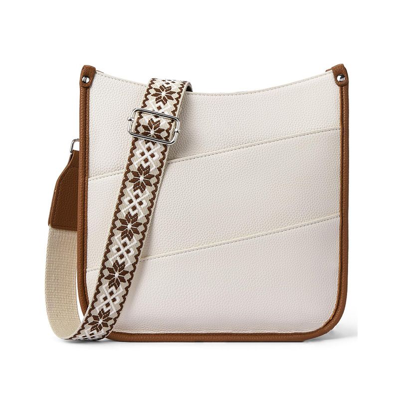 Trine Madsen | Crossbody taske i cognacbrun faux læder med boho skulderrem