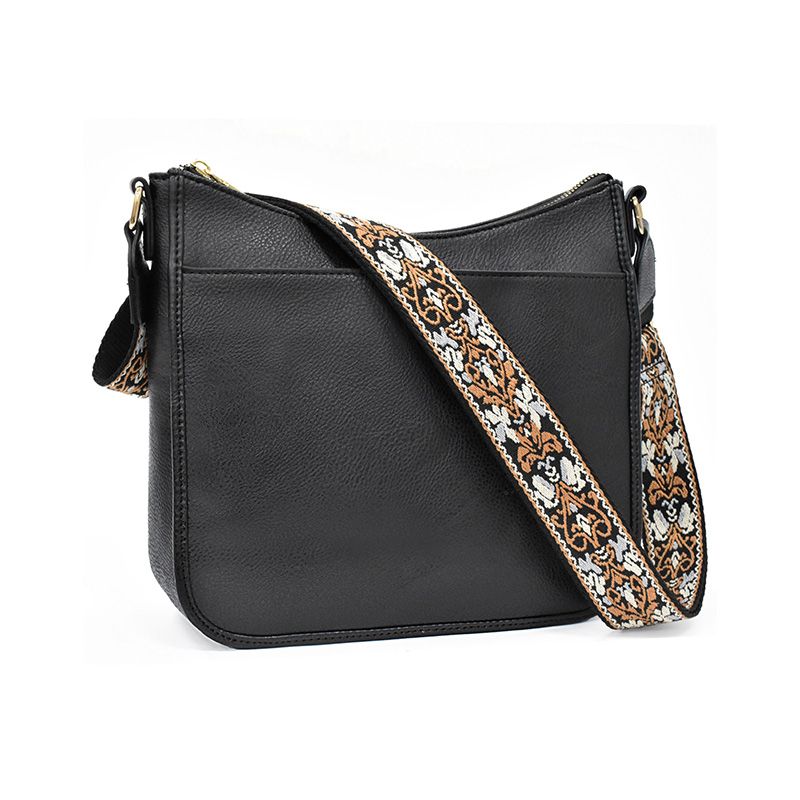 Trine Madsen | Crossbody taske i cognacbrun faux læder med boho skulderrem