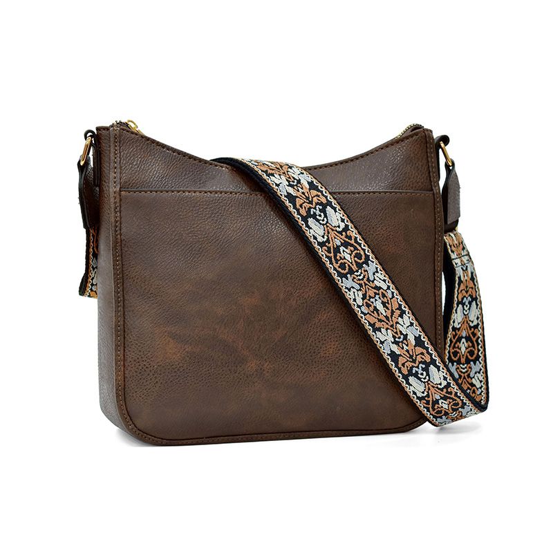 Trine Madsen | Crossbody taske i cognacbrun faux læder med boho skulderrem