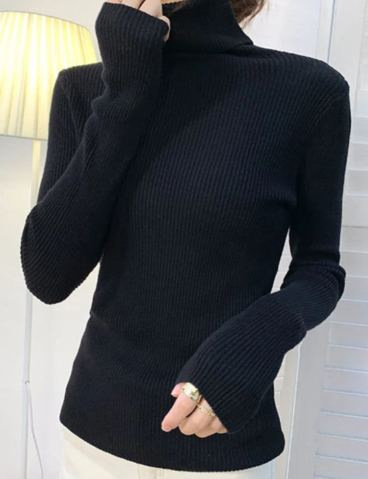 Mette Aagaard | Ribstrikket rullekrave-sweater til kvinder